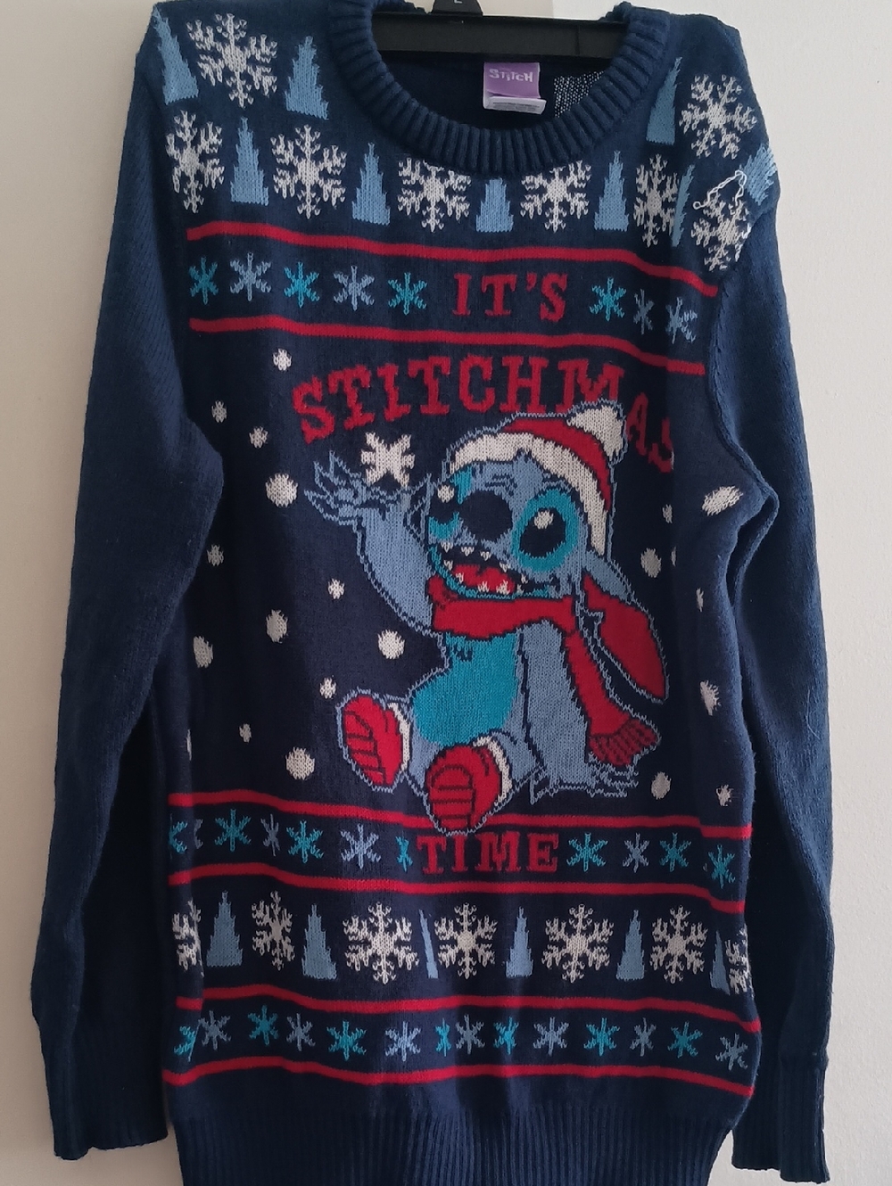 Lilo & Stitch branded "It's Stitchmas" holiday sweater. Used 1 Time Size 10/12